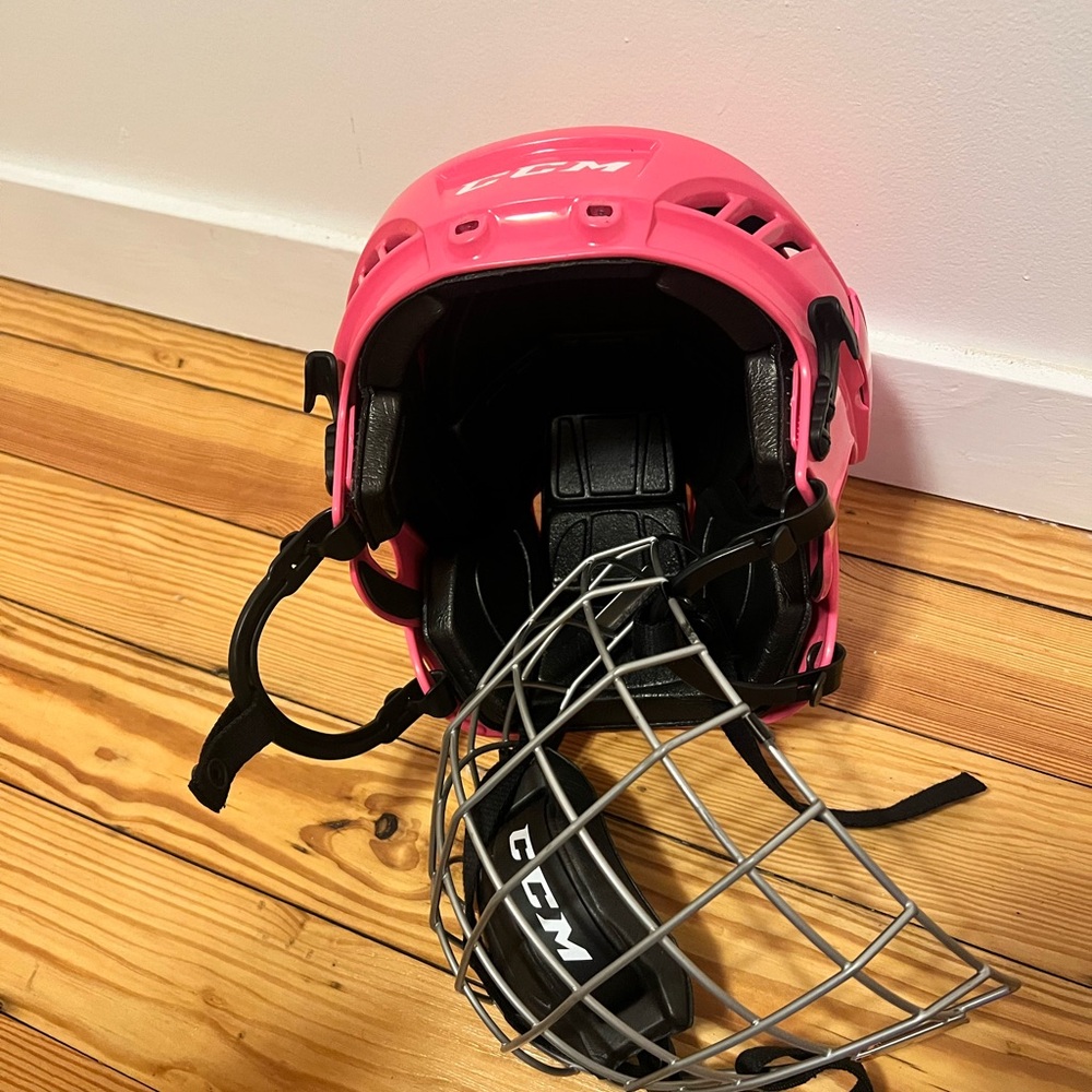 CCM hockey helmet with cage pink